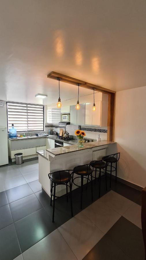 Elegante Apartamento Con Vistas Al Volcan Tungurahua บาญอส ภายนอก รูปภาพ